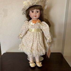 Miss November Gorham porcelain doll with stand